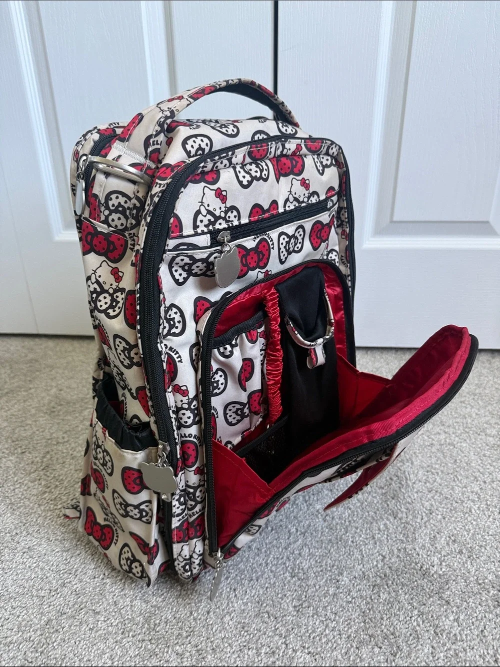Ju-Ju-Be Hello Kitty Cream Backpack with Red & Black Bow Print